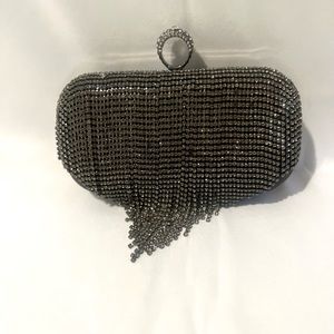 Black rhinestone fringe clutch purse.